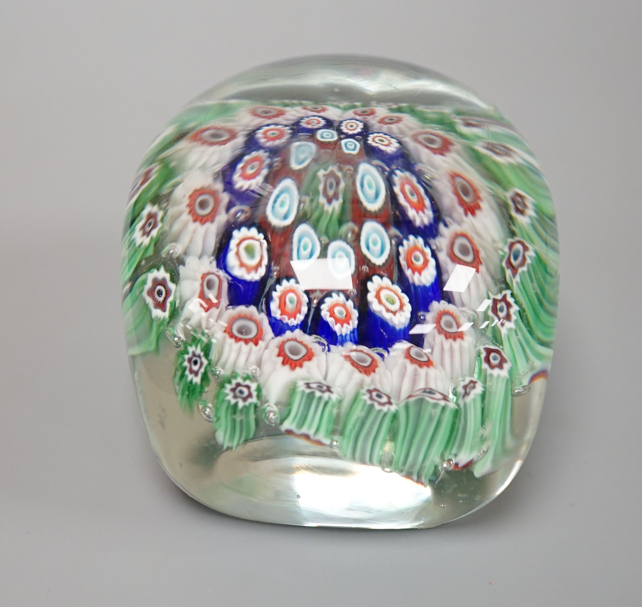 An unusual rectangular millefiori glass paperweight, probably Murano, 9.4cm